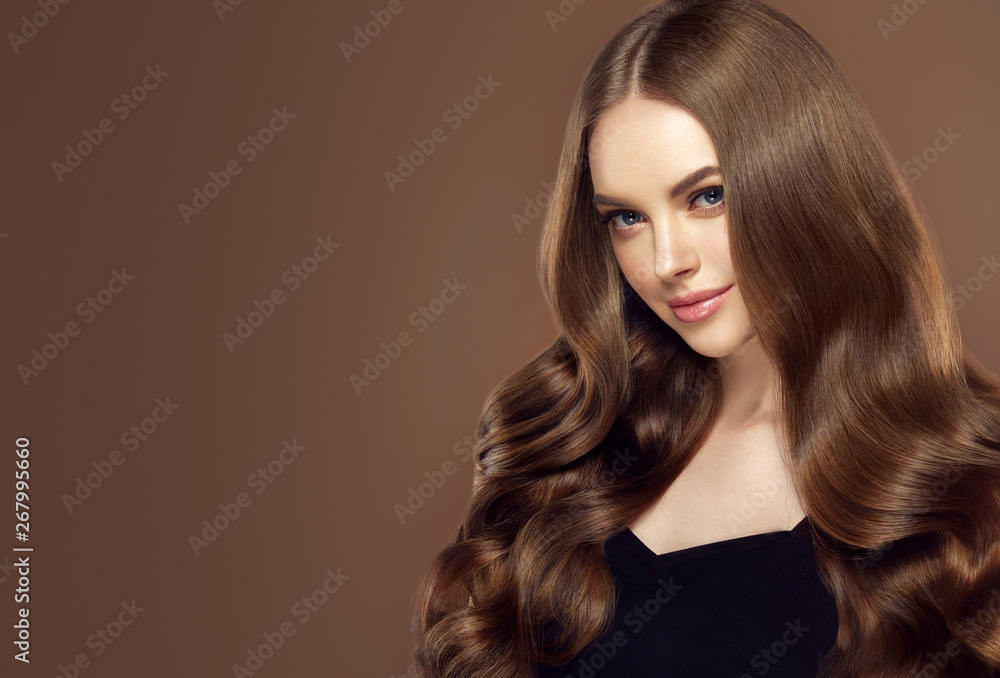 Beauty girl with long and shiny wavy hair . Beautiful woman model with ...