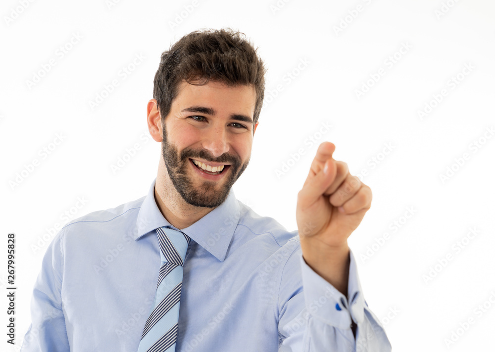 Portrait of a young handsome and confident businessman pointing as touching virtual screen Portrait of a young handsome and confident businessman pointing as touching virtual screen