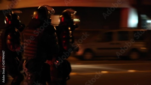 Rio de Janeiro/Brazil - 28th December 2014: Riot police with gas cannisters running to join police line
