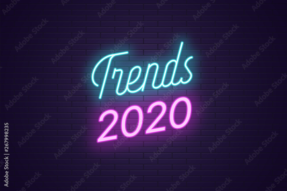 Neon lettering of Trends 2020. Glowing bright text