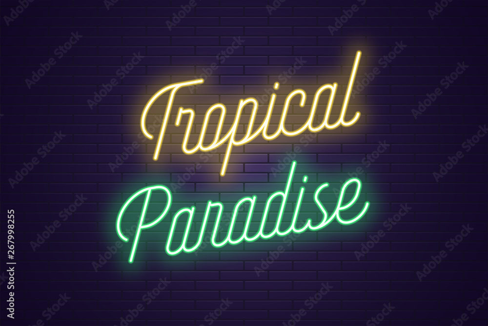 Neon lettering of Tropical Paradise. Glowing text