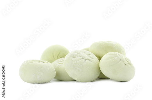 Heap of raw dumplings with tasty filling on white background