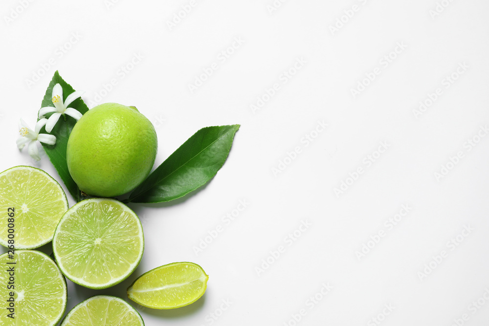 Citrus fruits, flowers and leaves on white background, top view Citrus fruits, flowers and leaves on white background, top view