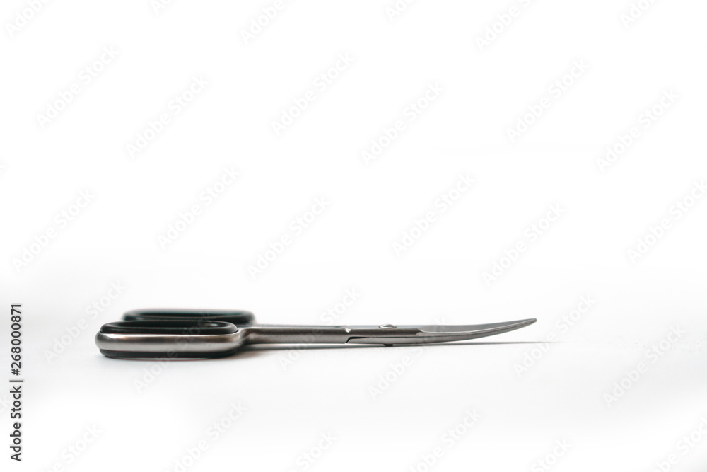 Nail scissors on white isolated white background. Fashion beauty theme. Stock photo Nail scissors on white isolated white background. Fashion beauty theme. Stock photo