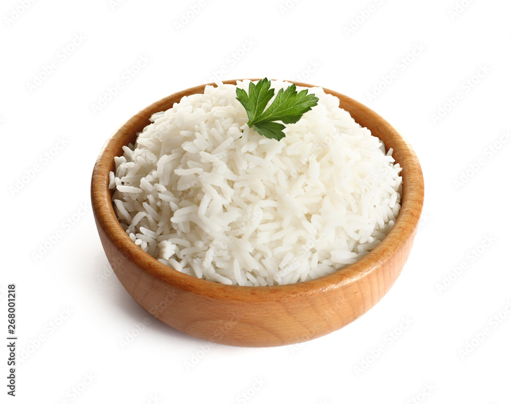 Bowl of tasty cooked rice with parsley on white background Bowl of tasty cooked rice with parsley on white background