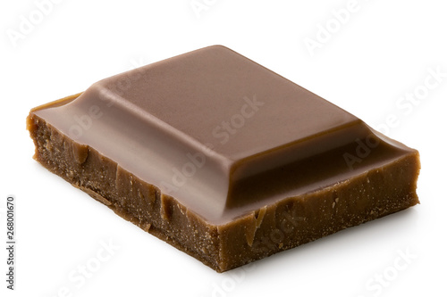 Single square of milk chocolate isolated on white. Rough edges.