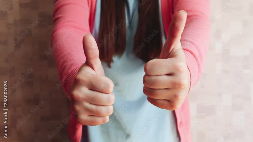 Beautiful woman show thumbs up, motivation and agreement concept Beautiful woman show thumbs up, motivation and agreement concept
