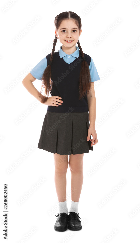 Full length portrait of cute girl in school uniform on white background Full length portrait of cute girl in school uniform on white background