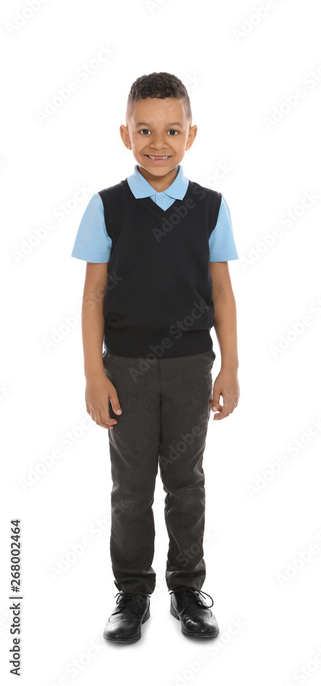 Full length portrait of cute African-American boy in school uniform on white background Full length portrait of cute African-American boy in school uniform on white background