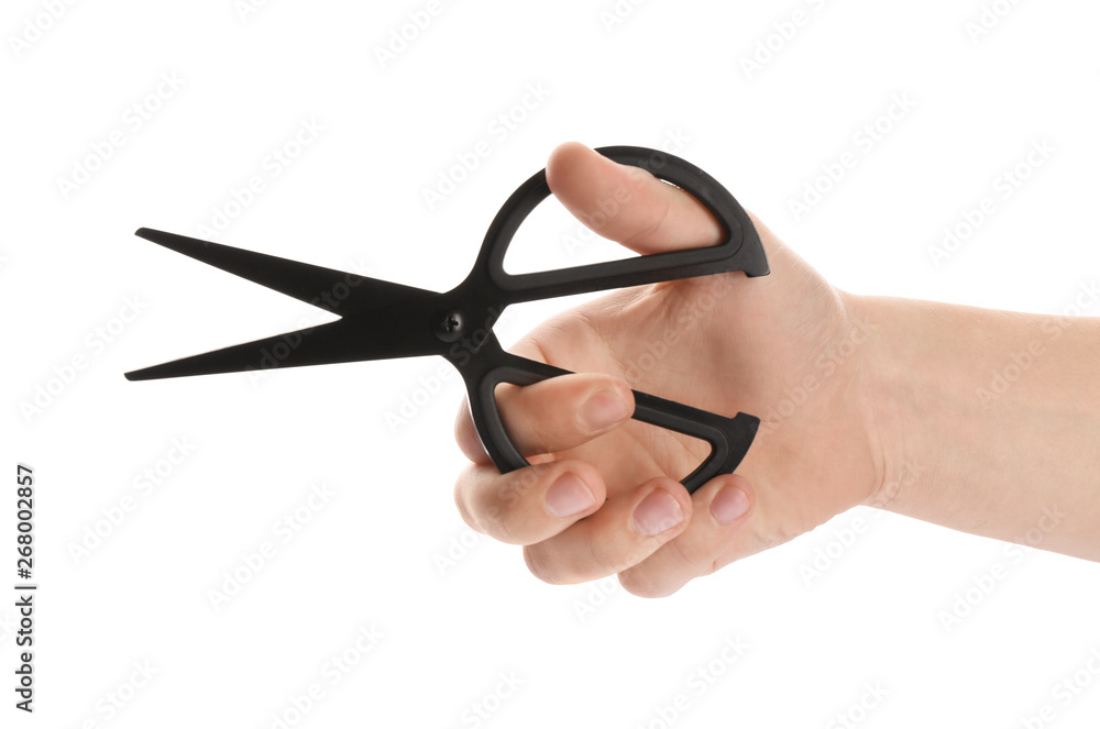 Man holding pair of sewing scissors isolated on white, closeup Man holding pair of sewing scissors isolated on white, closeup