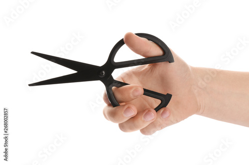 Man holding pair of sewing scissors isolated on white, closeup