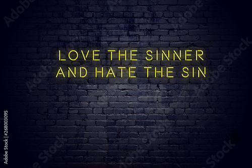 Obraz na plátně Neon sign with positive wise motivational quote against brick wall