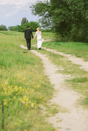 Wedding couple in a walk © Dragica