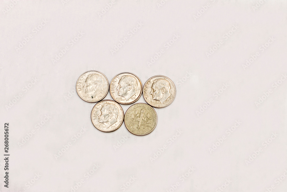 One dime coins of USA isolated on the white background One dime coins of USA isolated on the white background
