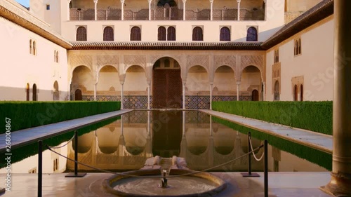 The Nasrid Palaces Courtyard of the Myrtles in the Alhambra fortress in Granada, Spain photo