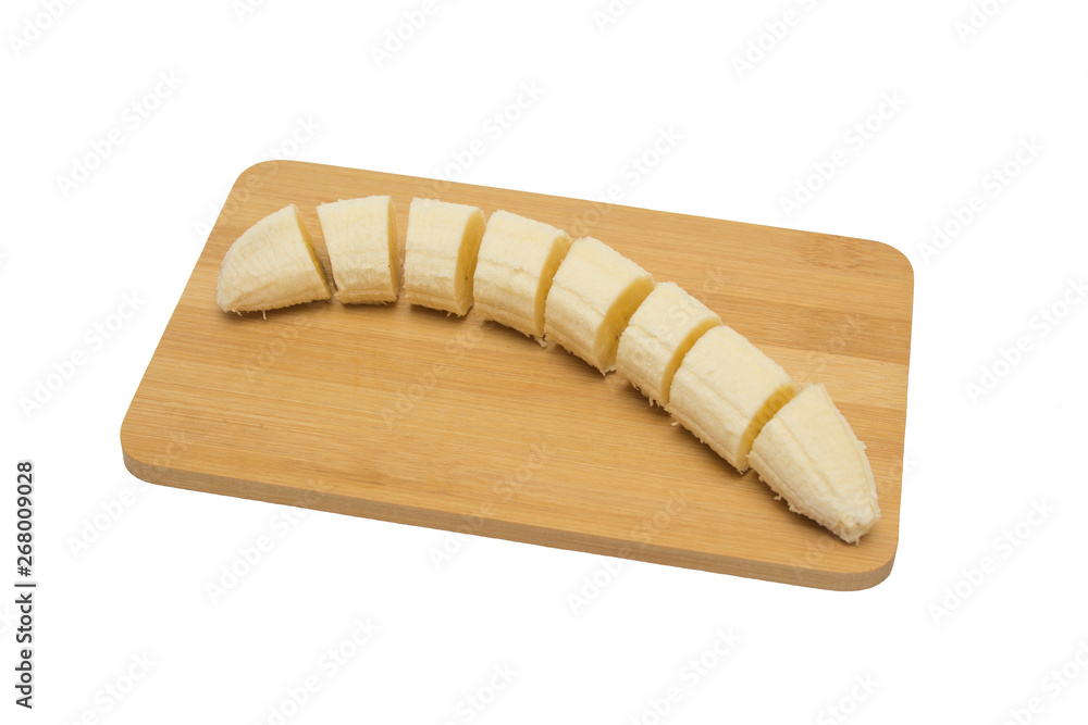 sliced banana on a cutting board, gradual serial cutting sliced banana on a cutting board, gradual serial cutting