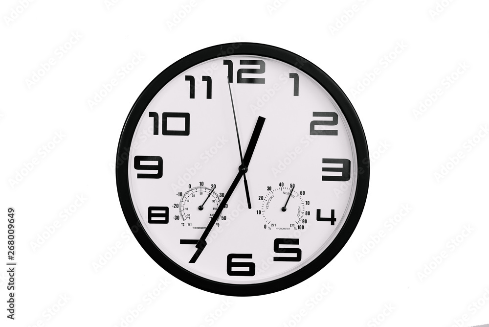 simple classic black and white round wall clock isolated on white. Clock with arabic numerals on wall shows 12:35 , 00:35 simple classic black and white round wall clock isolated on white. Clock with arabic numerals on wall shows 12:35 , 00:35