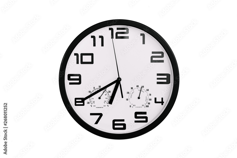 simple classic black and white round wall clock isolated on white. Clock with arabic numerals on wall shows 18:40 , 6:40 simple classic black and white round wall clock isolated on white. Clock with arabic numerals on wall shows 18:40 , 6:40