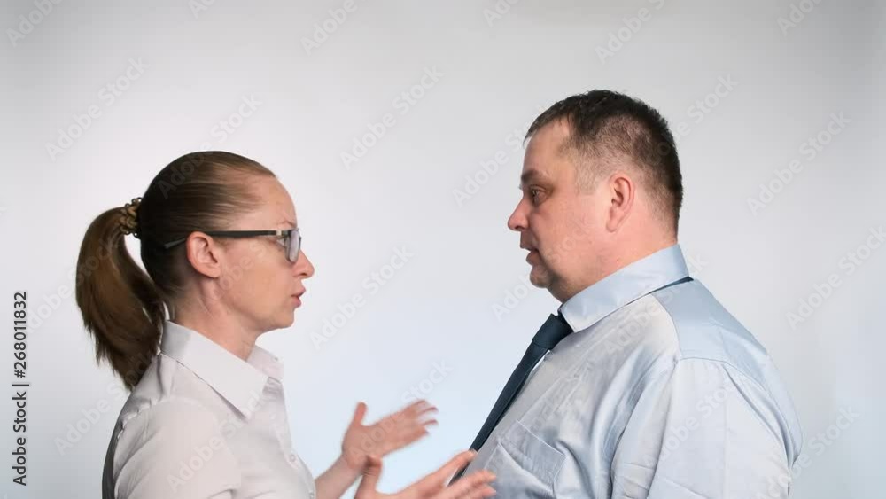 Office staff quarrel among themselves during work. The conflict between workers. Office staff quarrel among themselves during work. The conflict between workers.