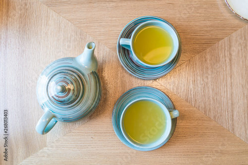 fruit tea in a beautiful blue tea set for two persons top view