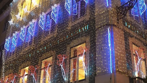 Over-the-top, excessive Christmas holiday season lights decoration in a building in Baixa Chiado, Lisbon, Portugal.