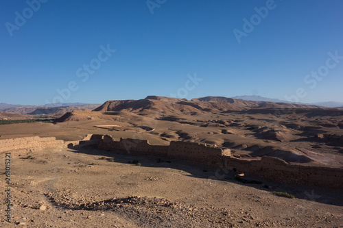 Morning view on the desert from the top of the Kasbah Ait Ben Haddou near Ouarzazate in the Atlas Mountains of Morocco.