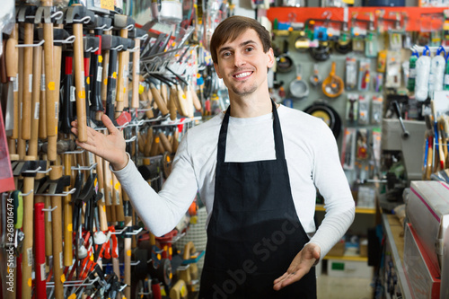 Professional pleasant salesman working and smiling