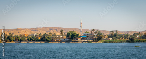 Buildings, houses and mosques on the banks of the Nile river. Egypt photo