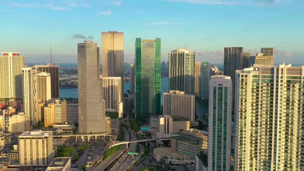 MIAMI, FLORIDA, USA - MAY 2019: Aerial drone view flight over Miami downtown. Hotels, business buildings from above. MIAMI, FLORIDA, USA - MAY 2019: Aerial drone view flight over Miami downtown. Hotels, business buildings from above.
