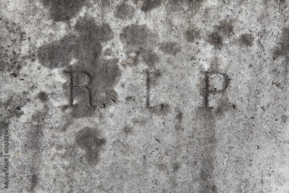 RIP. Rest in peace. Traditional inscription on the grave.