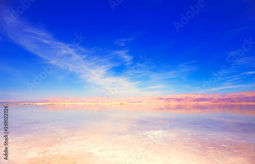 Beautiful view of salty Dead Sea shore with clear water. Ein Bokek  Israel.