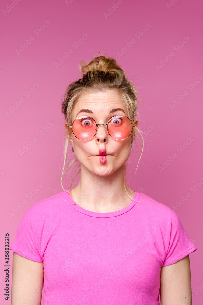 Portrait of blonde in pink T-shirt Portrait of blonde in pink T-shirt