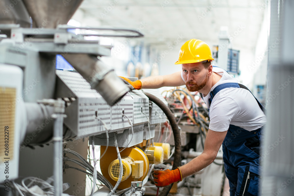 Portrait of man working in factory Portrait of man working in factory