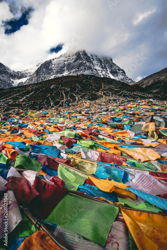 multicolored flaglets near mountains photo