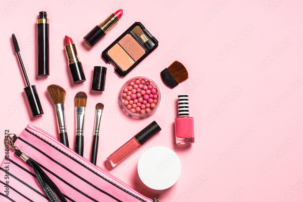 Makeup professional cosmetics on pink background. Makeup professional cosmetics on pink background.