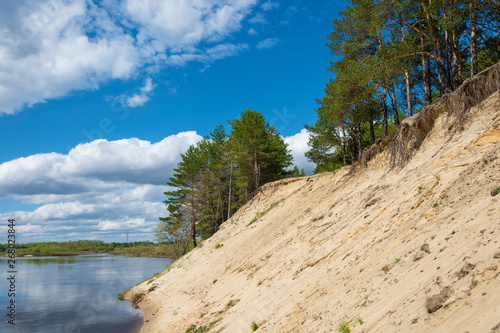 Steep sandy cliff on the Klyazma River in the Ivanovo region.