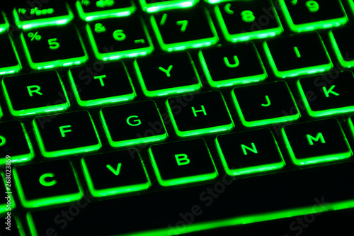 Close-up of a backlit gaming keyboard.