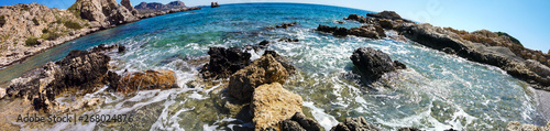 beautiful stony coast of mediterranean sea in greece in sunny day. Wideangle