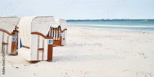 Wooden beach chairs, white sand beach, Rugen Island, Germany 