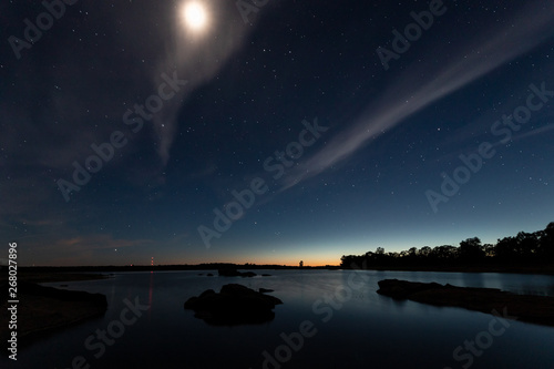 Night landscape with moon in the swamp of Valdesalor. Extremadura. Spain.