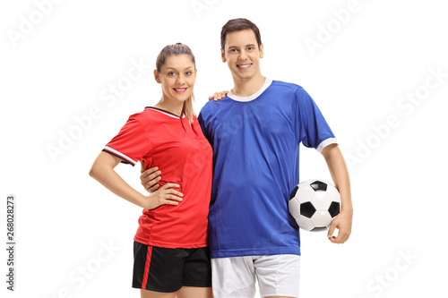 Female and male soccer players with a football © Ljupco Smokovski