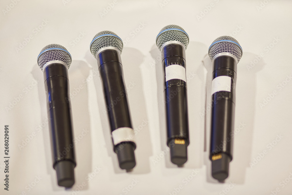Microphones on a white background. Close-up