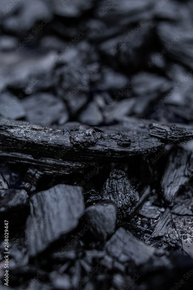 Close-up of black wet charcoal for background Close-up of black wet charcoal for background