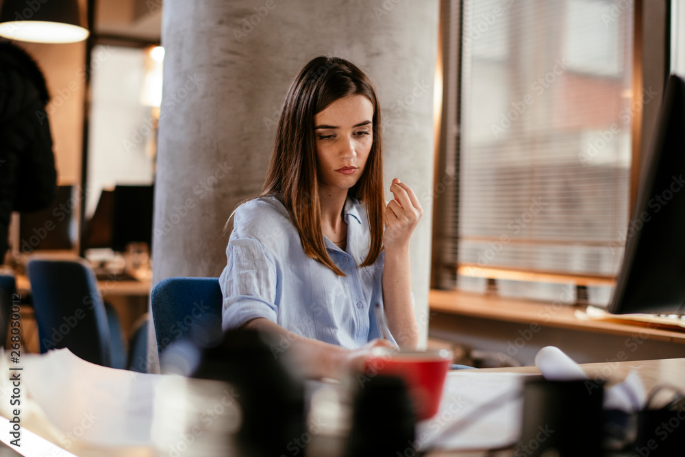 Businesswoman working on project Businesswoman working on project