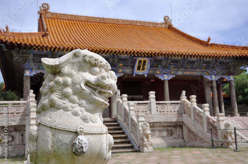 Stone Lion Statue in front of Long'en Hall of Fuling Tomb of Qing Dynasty, Shenyang, China. Fuling Tomb is a UNESCO World Heritage Site since 2004. Fuling Tomb (East Tomb) is the mausoleum of Nurhaci. photo