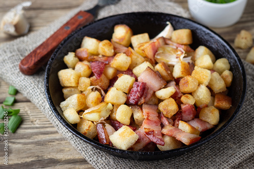 Traditional dish of Spanish cuisine - migos from bread.