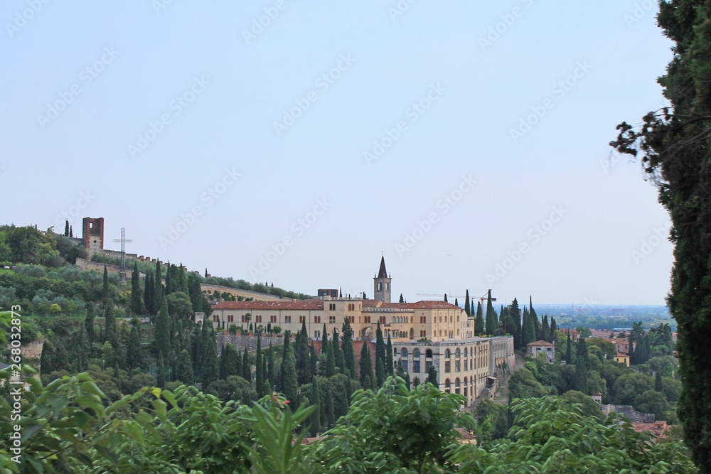 Panorama of Verona Italy with a view of the red roofs of the old town and the tower