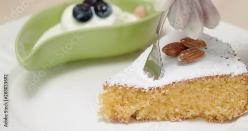 4K - Slice of almond cake photo