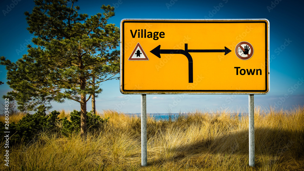 Street Sign to Village versus Town