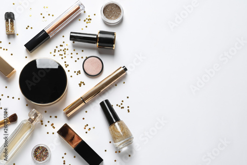 Set of luxury makeup products on white background, flat lay